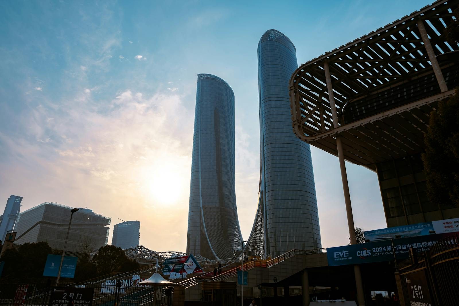 Stunning view of Hangzhou Century Center skyscrapers at sunset, showcasing modern urban architecture.